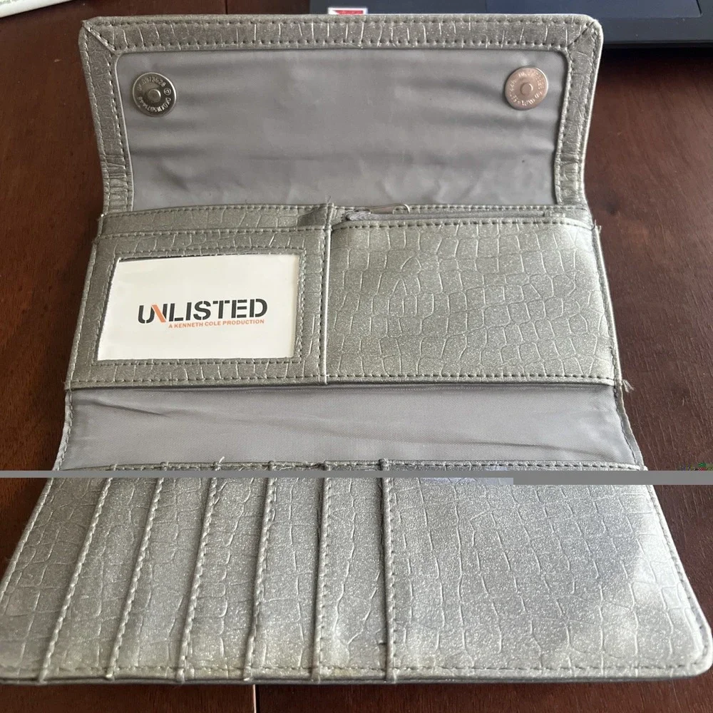 Silver Unlisted Kenneth Cole urban organizer clutch wallet faux leather exterior